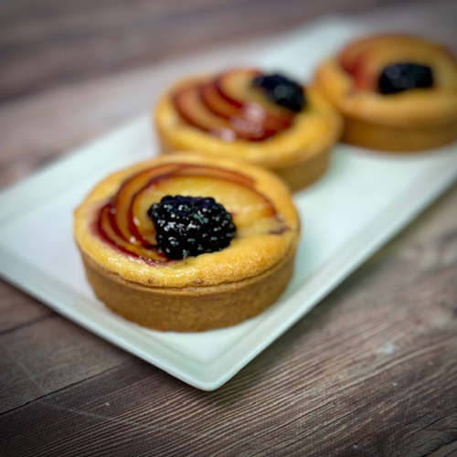 French Hazelnut Frangipane Tartlet with Blackberries and Plums